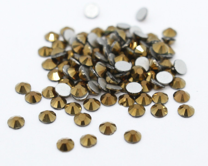 Stikliniai GOLD akmenukai 100vnt.